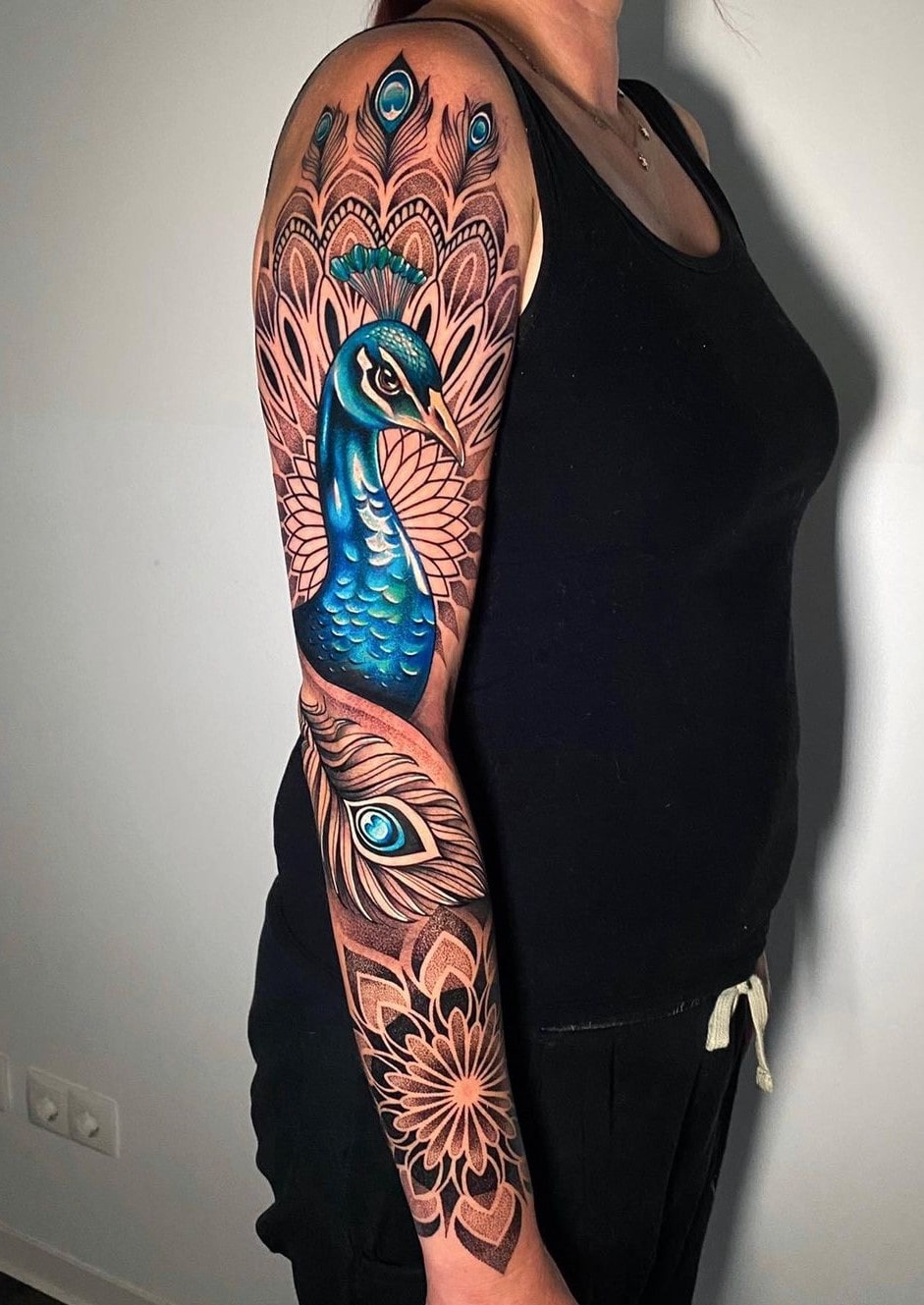 peacock feather tattoo on hand  Tattoo Ink Master