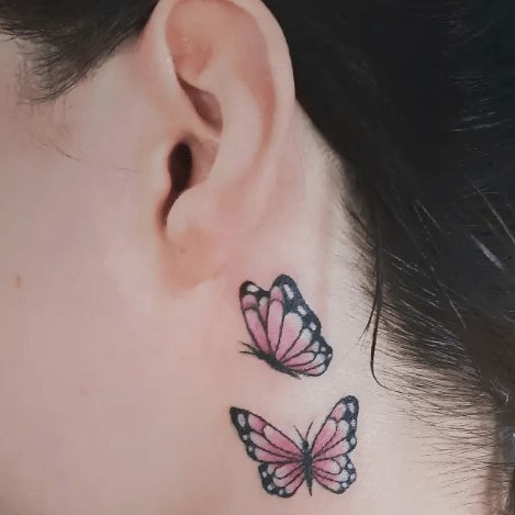 Behind the ear butterfly tattoo pink