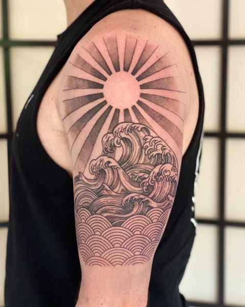 Matching sea Sun and sea Moon tattoos