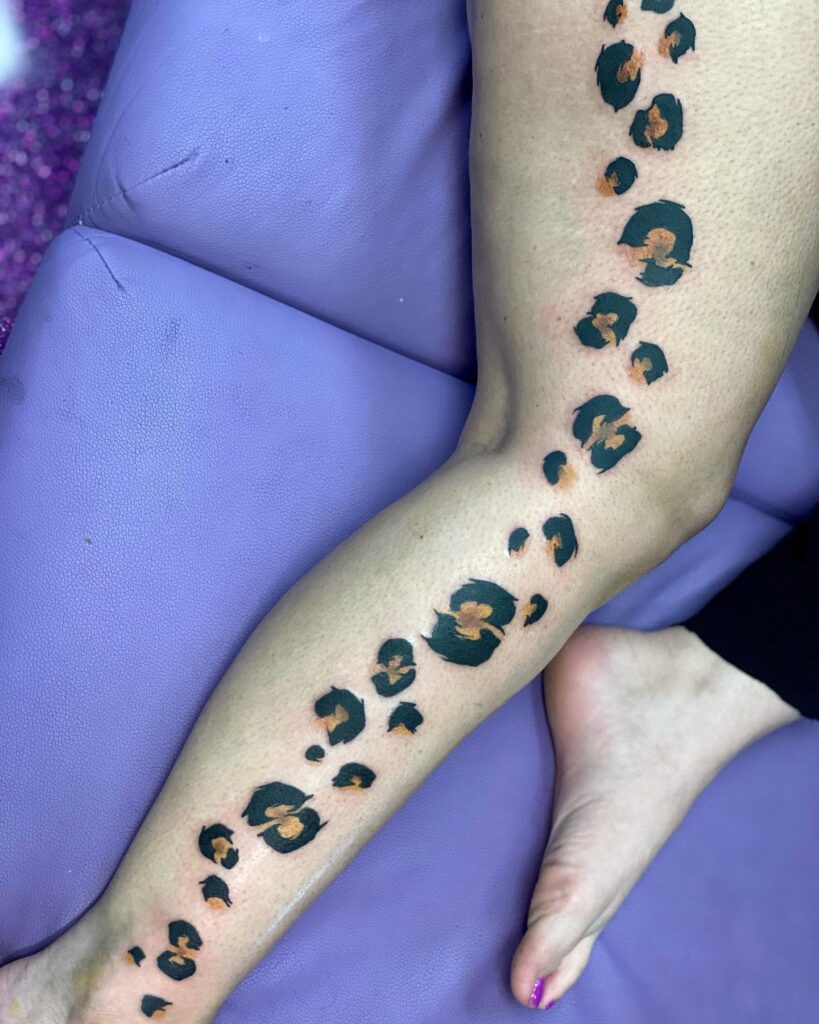 cheetah print tattoos on thigh