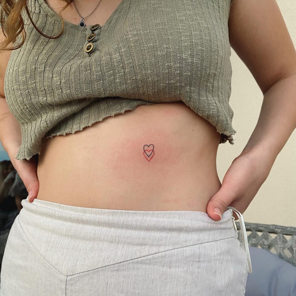 File:Woman with four star tattoos on her belly, and a navel piercing.jpg -  Wikimedia Commons