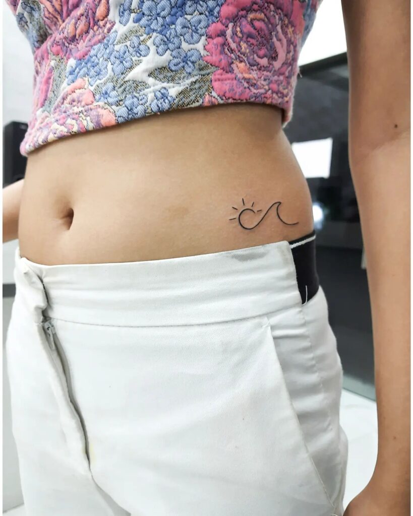 Butterfly tattoo on the waist