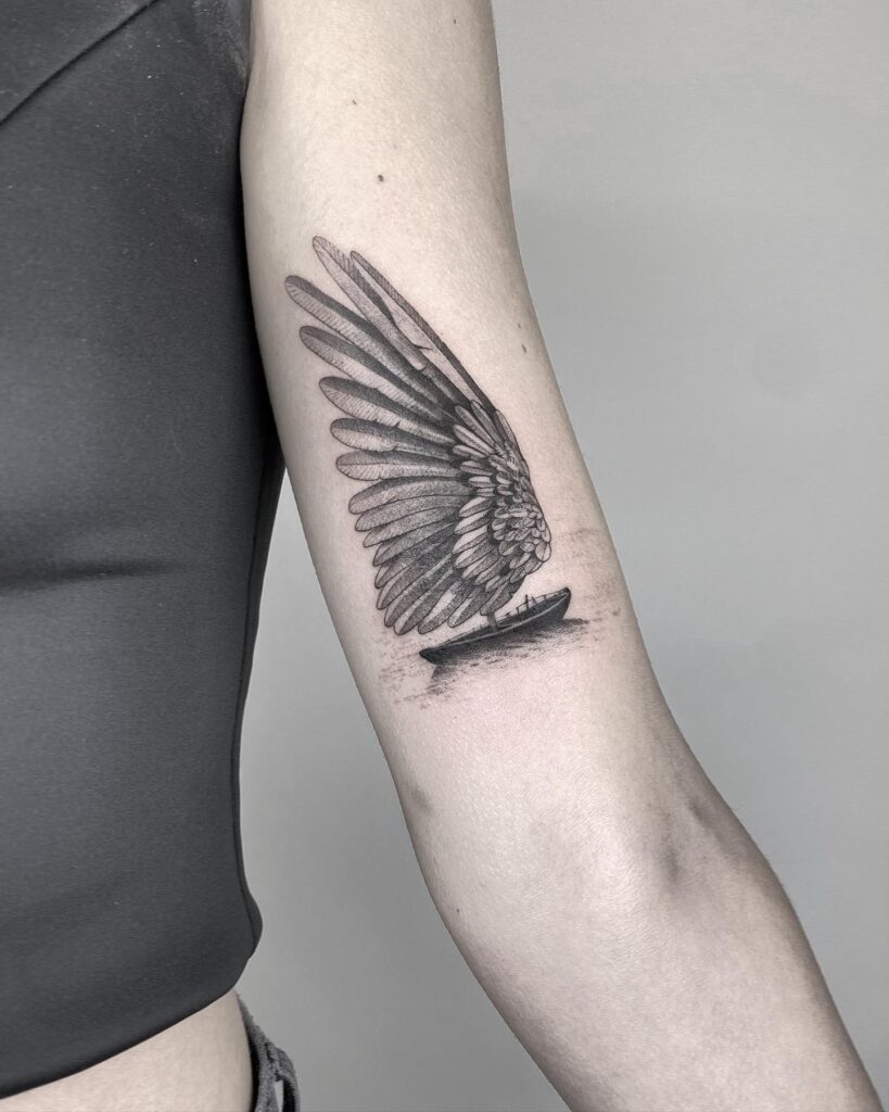 Tattoo uploaded by Imperial ink tattoos • #wing #blackandgrey #arm #tattoo  #feathers #bird #birds • Tattoodo