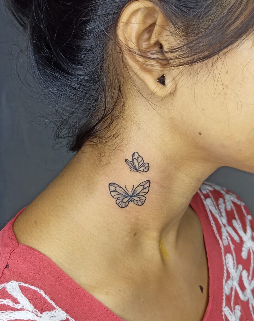 Pretty Butterfly tattoo on side neck